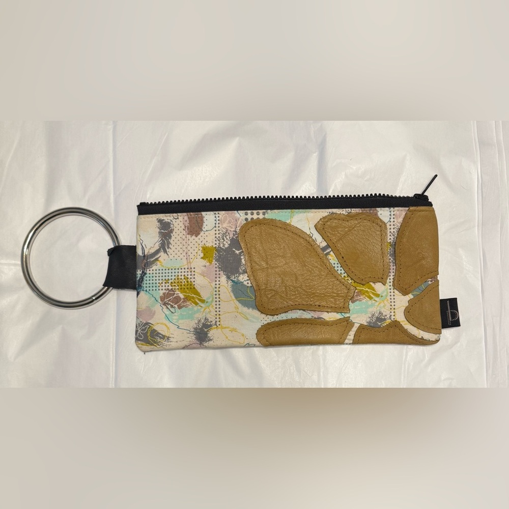 Permanent Baggage Lace Lined Leather Wristlet